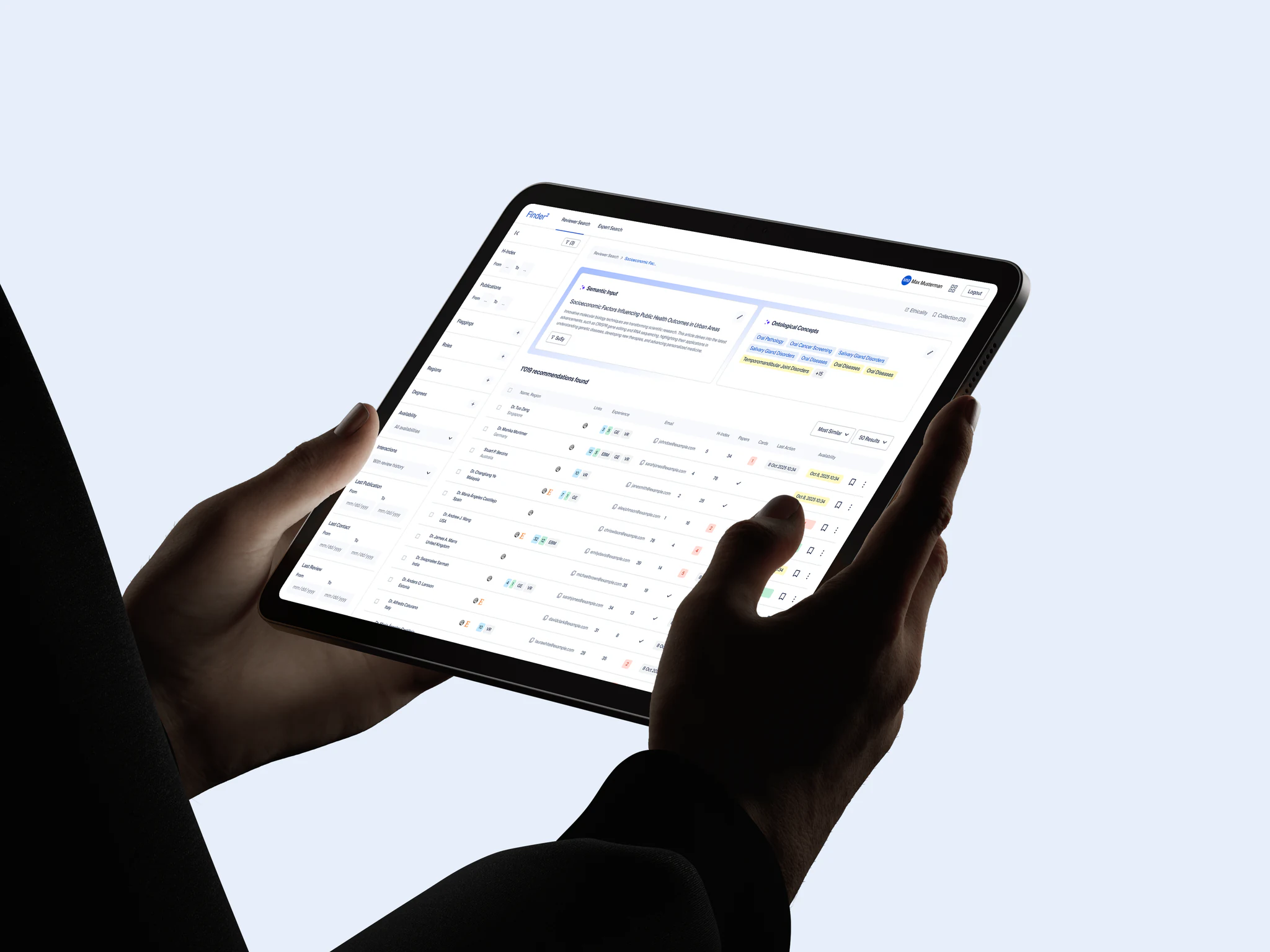 Person holding a tablet displaying the Tasseo expert search interface